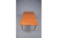 Dismantlable Finn Juhl solid teak dining table with 2 leaves.