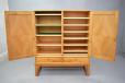 Midcentury light oak storage cabinet with adjustable internal shelving