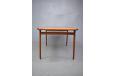Spacious table with slime line profile allowing for carver chair arms to fit underneath