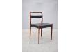 Oddense Maskinsnedkeri model OD 69 dining chairs in vintage rosewood and black leather upholstery designed by Kai Kristiansen