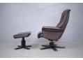 Swivel & reclining easy chair with footstool both in brown leather upholstery. 