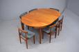 Vintage teak round table with 6 matching side chairs made in Denmark