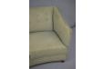 Pale green colour upholstery is in good condition with minor signs of age and use.