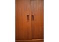 Elegant sliding doors in teak with carved elongated handle for easy sliding