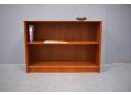 Low & wide teak bookcase made in Denmark.