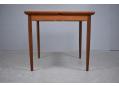 Midcentury Danish design dining table with tapering legs and square top