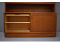 Teak 2 section wall unit with sliding door base cabinet.