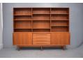 Vintage teak sideboard with bookcase top and lots of storage. 