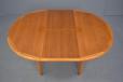 Midcentury teak round dining table produced by Danish Mobelfabrik