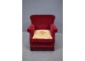 Danish design red velour low back armchair with reversible cushion. SOLD