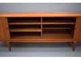 Huge amounts of storage offered in this sideboard in teak. 