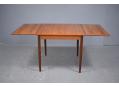 Teak dining table with square top that can be extended with 2 draw leaves.