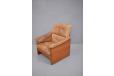 The high back armchair offers comfortable seating in a striking design chair