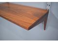 CADO system 38cm deep shelf in rosewood with dowel-mounted supports. 