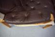 High-back brown leather armchair with footstool | Nielaus Mobler - view 11