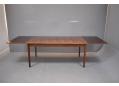 Rosewood dining table with both draw leaves in use and now able to seat 10 / 12