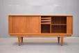 Short teak sideboard with sliding doors designed by Bernhard Pedersen & Son 1966
