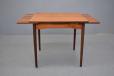 Midcentury teak dining table with square top produced by Danish Mobelfabrik