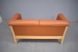 Tan colour leather upholstered 2 seat sofa made in Denmark.