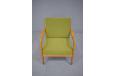 With a small footstool in the same sprung cushioned beech frame 
