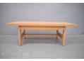Danish design coffee table with large top made of oak.