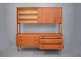 Internal shelved top section combines with 6 spacious drawers below.
