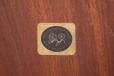 Solid rosewood legs can be dismangled with a screw drive. 