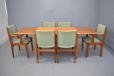 Midcentury teak dining table with 2 pull out leaves