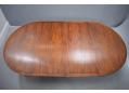 Stunning rosewood grain dining table by P Jeppersen for sale.