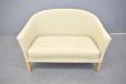 Danish Design 2 seater sofa with woven cream upholstery