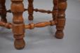 Small hexagonal foot stool with turned legs and original uncut moquette upholstery