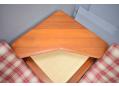 Solid teak tri-angle top corner table with new cane panel.