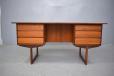 spacious desk in vintage teak measuring 60 inch / 152 in width