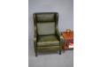Classic wingback armchair in original green leather - view 10
