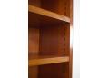 The shelves are all adjustable & can be moved around pre-drilled holes.