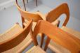 Midcentury teak dining chairs with 2 carvers designed in 1951 by Niels O Moller