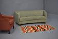 A stylidh and unique 3 seat sofa produced in mid-1950s by cabinet maker