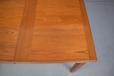 Vintage teak dining table with 2 draw leaves designed by Henry Kjaernulf 