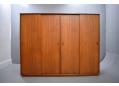 Vintage wide teak wardrobe with 4 sliding doors. Dismantles for delivery. SOLD