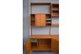 Modular teak 4 bay shelving system designed in 1952 by Kai Kristiansen
