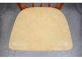 Cream colour vinyl seat upholstery is in good condition on all chairs