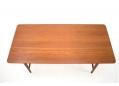 Beautiful solid teak top with rich grain patterns and oiled finish