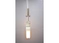 The light source can be lifted or lowered inside the pendant