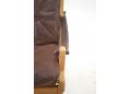 Model 'Hunter' easy chair in brown leather upholstery.