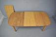 Solid oak dining table extending with 2 extra leaves for sale