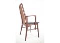 Danish design rosewood frame armchair with original black leather seat. 