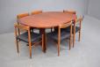 Vintage rosewood dining table extending with 2 extra leaves for sale