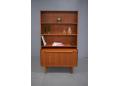 Teak writing bureau with pull out desk, drawers and bookcase storage.