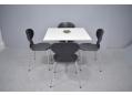 Jacobsen square table with Ant chairs sold separately. 