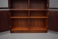 Vintage rosewood wall unit with locking doors designed by Kai Winding